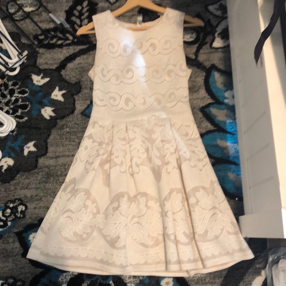 Eggshell white colored dress Knee length